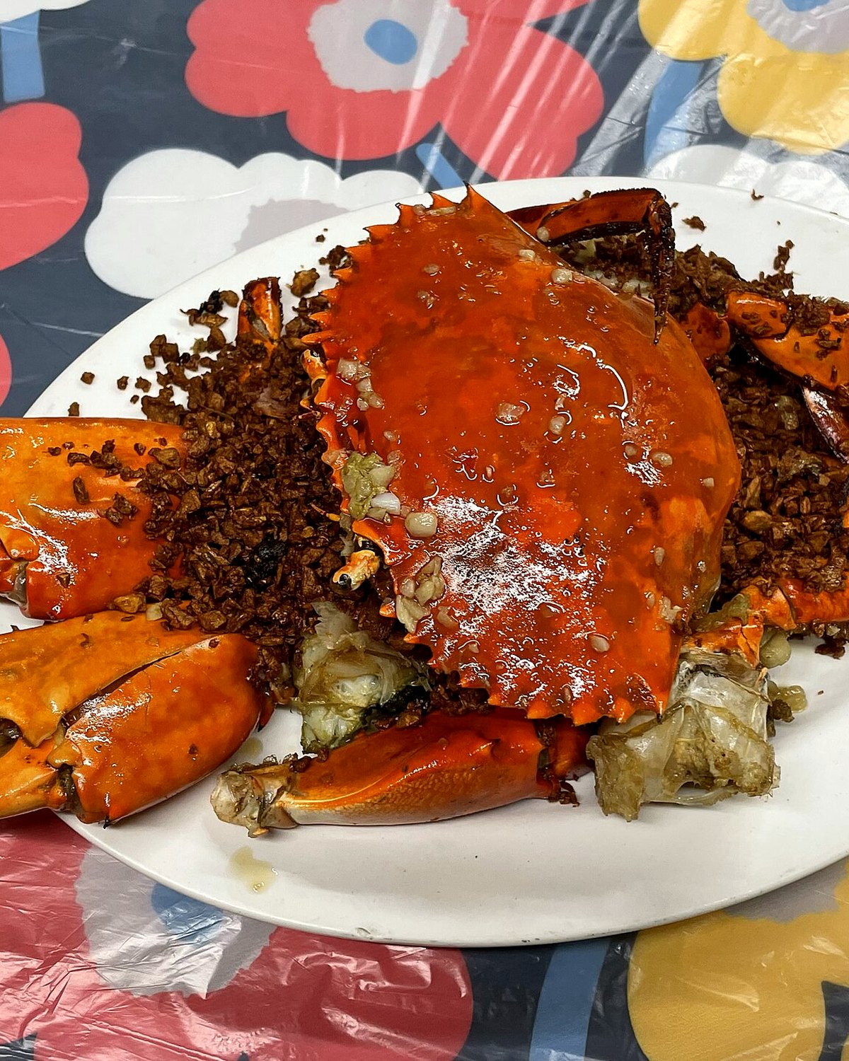 A whole cooked crab prepared Hong Kong style